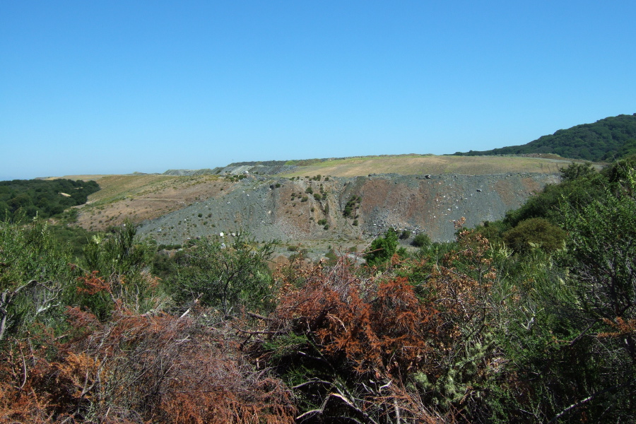 We're drawing even with the quarry tailings.