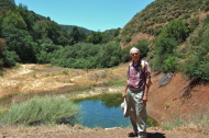 David stands before the small pond in Rogue Valley.