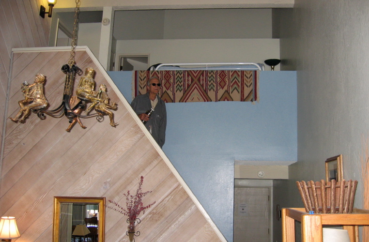 David descends from his loft, a Class 2 climb.