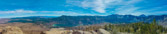 White Mountains in the distance at the left, below is June Lake (l) and Gull Lake (r).  June Mountain Ski Resort, San Joaquin Mountain, and the Ritter Range beyond.