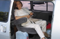 Kay relaxes in the Captain's Chair at a rest stop on I-5 near Buttonwillow.