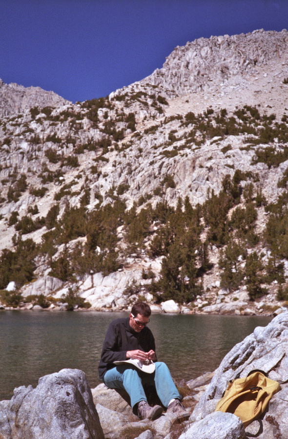Bill fixes the drawstring on his hat at Ruby Lake.