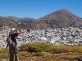 Tioga Peak (11526ft) rises in the background.  <br />Photo courtesy of Frank Paysen