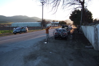 Denny Sahovic and Morris Jones set up a long-wave antenna behind the Paicines Store..