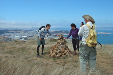 David snaps a photo of Dan and Cara at the large cairn on the end of the Southeast Ridge.