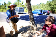 Frank and Bill compare notes.