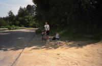 Bill and Chris rest at the top of Mtn. Charlie Rd.