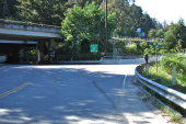 El Rancho Rd. goes right; La Madrona goes straight, under the freeway.