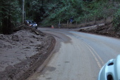 Riding through the remains of a mud slide onto Glenwood Drive