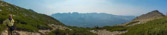 Gray Peak as at the right, and Pyramid Peak is two peaks beyond where Frank is.  We'd have to wade through a sea of whitebark pines to avoid scrambling over large boulders on the ridge.