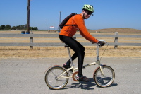 Zach models his fixed-gear Dahon.