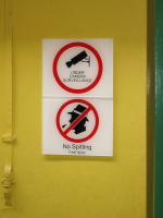 Signs to remind us we're in Singapore, not in India