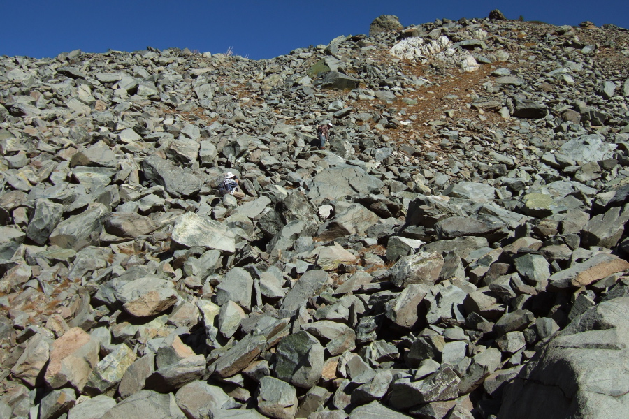 Frank and Stella make their way down a pile of talus.