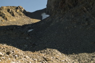 The pass doesn't look far, but getting there means climbing a steep talus slope.