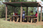 David rests at the picnic table.