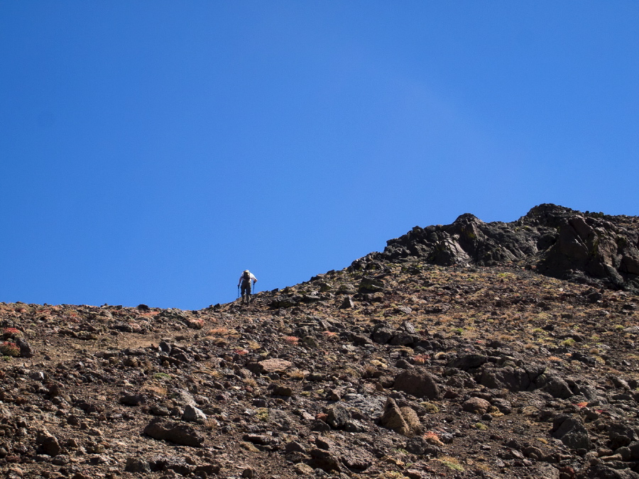 Bill works his way up the rocky upper section of the route.