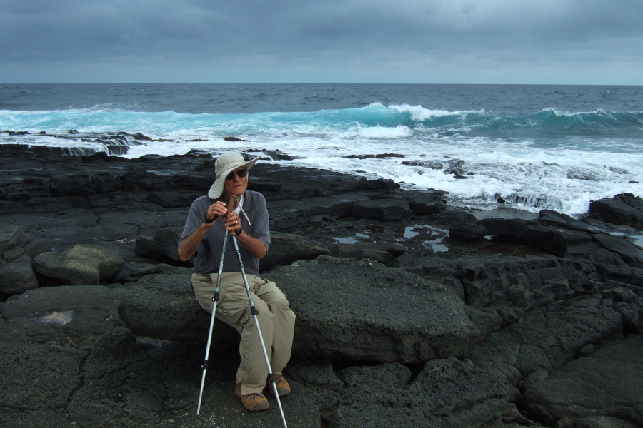 David takes a break near the pounding surf.
