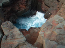 Video: The surf fills and empties this pool through a tube to the sea.