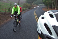 The soggy riders press on up Pig Farm Hill.