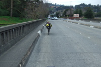 Zach climbs across the BNSF bridge in Pinole.