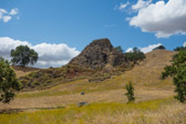 We crossed the ridge immediately to the right of this plug along the truck tracks through the meadow that can be seen.