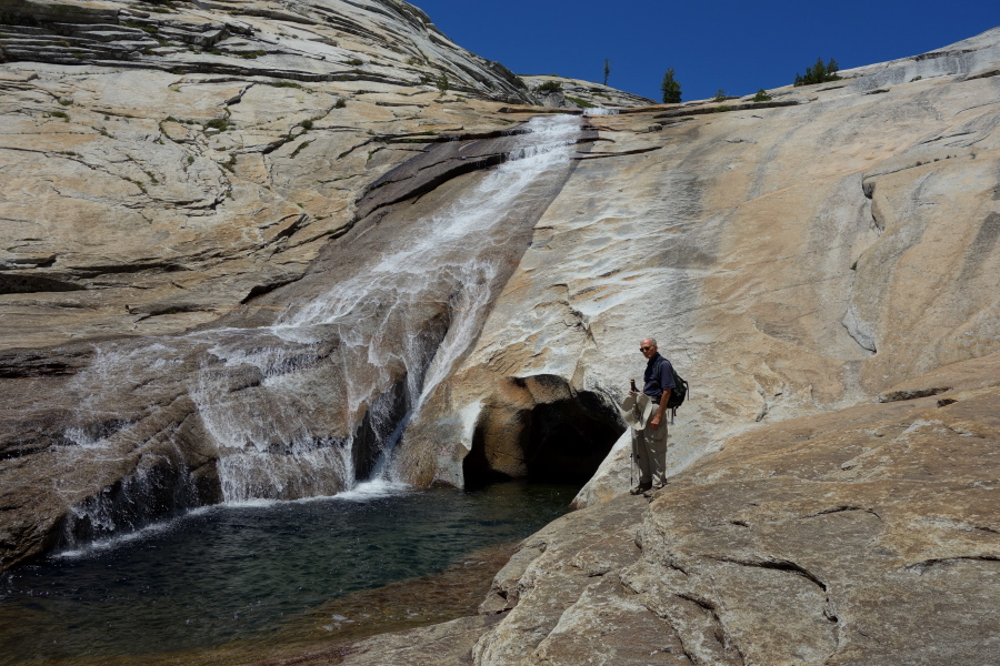 David at the brink of a deep pool.