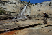The creek runs over slabs.