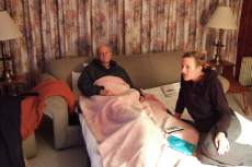 David and Laura watch television.
