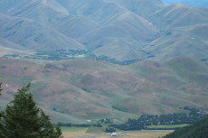 A paraglider soars over Ketchum.