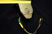 Motor on mounting bracket.