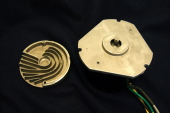 Motor rear cap and motor faceplate