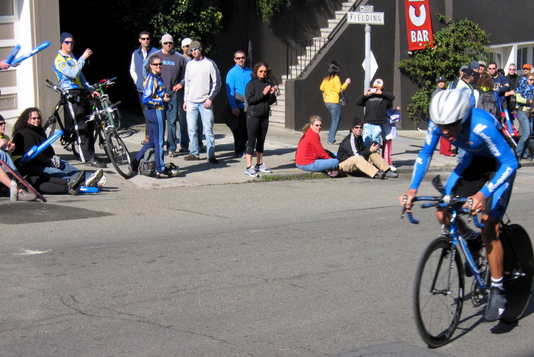 A Navigators rider climbs Stockton St.