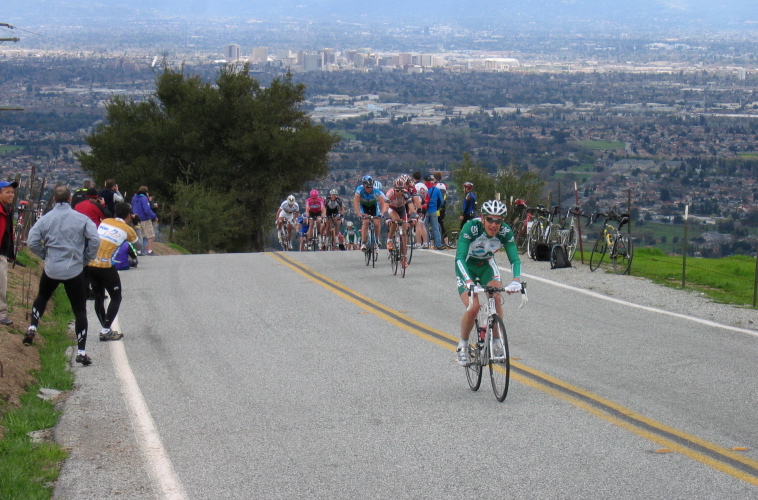 Mads Kaggestad rides just ahead of a larger group.
