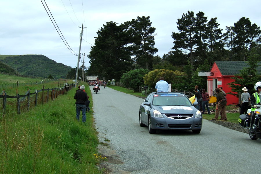 The race official popping out of the sunroof, watching to make sure everyone behaves.