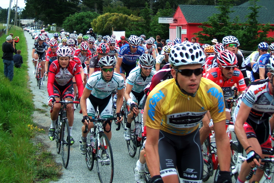 Tour leader, Brett Lancaster, rides by.
