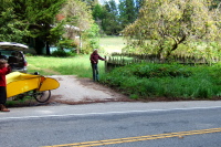 One of the local residents comes out to watch the spectacle.