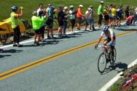 A rider from Team Type 1 with a thoroughly taped left leg.