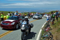 More officials standing up in the sunroof.