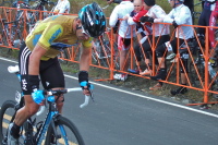 Overall Race Leader, Greg Henderson, does his best to honor the leader's jersey.