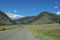 Trail Creek Rd. continues through a wide valley.