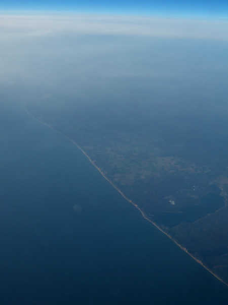Passing over the Michigan coast of Lake Michigan