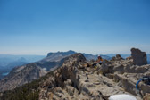 Mt. Hoffman, Half Dome, and May Lake are in the background.