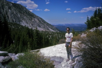Bill on a snowdrift next to Valentine Creek.