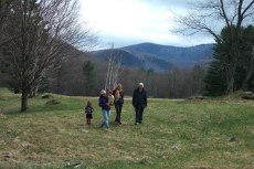 Camille, Janice, Natalie, Laura, and David make their way down the hill.