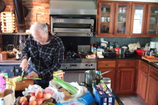 David prepares dinner.