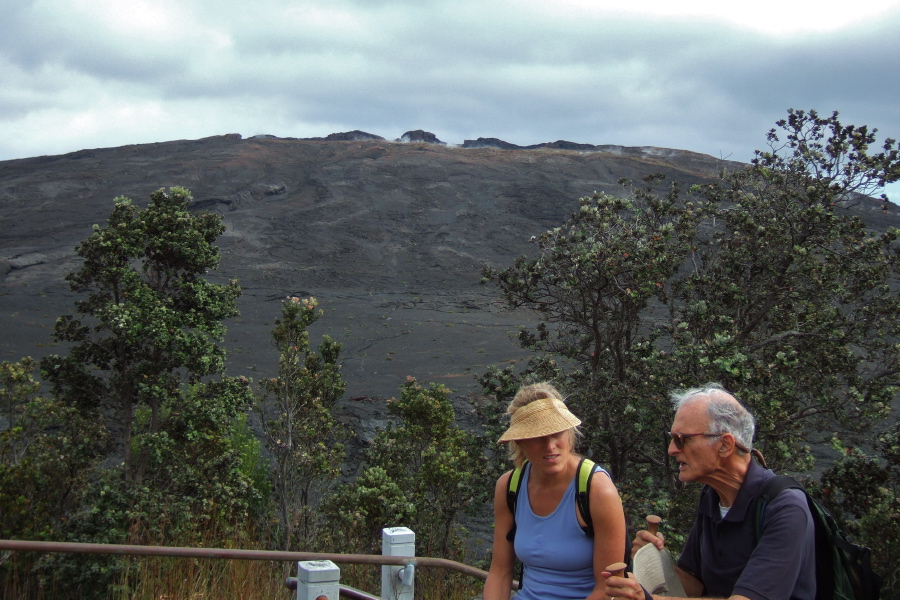 Laura and David talk ernestly under the shadow of Mauna Ulu.