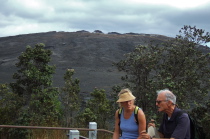 Laura and David talk ernestly under the shadow of Mauna Ulu.