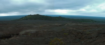 Pu'u Huluhulu stands as a small island of green surrounded by the wastes of Mauna Ulu.