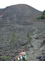 Laura takes a break in view of Pu'u Pua'i.
