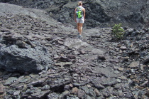 Laura goes to explore a cave in the side of Pu'u Pua'i.